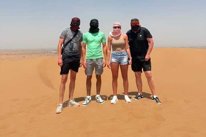 Dubai Morning 2-Seater Buggy Desert Tour: Dune Bashing, Sandboarding & Camel Ride photo 4