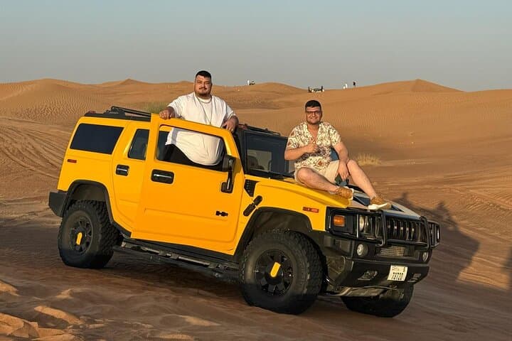 Dubai Hummer H2 Desert Safari with BBQ Dinner — Dune Bashing, Camels & Live Shows