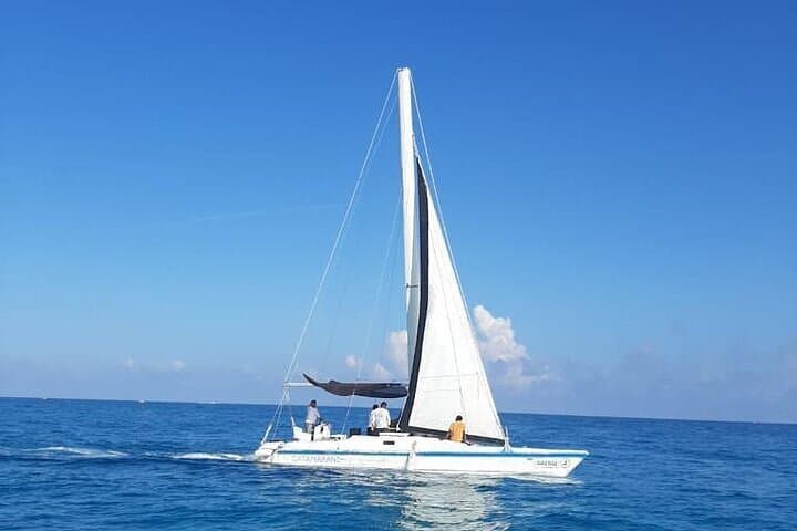 Private Catamaran Party to Isla Mujeres: Snorkel, Beach Club & Sunset photo 3