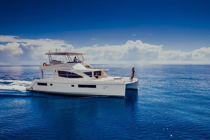 Riviera Maya Private 51' Leopard Yacht: 4-Hour Open Bar & Chef Snorkel Charter photo 2