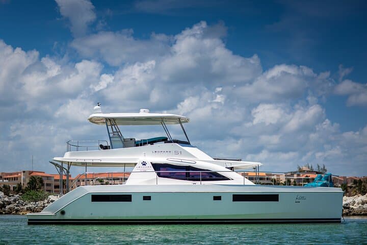 Riviera Maya Private 51' Leopard Yacht: 4-Hour Open Bar & Chef Snorkel Charter photo 4