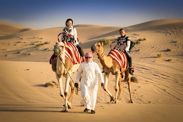 Abu Dhabi Desert Safari: Dune Bashing, Sandboarding & Bedouin BBQ Experience photo 2