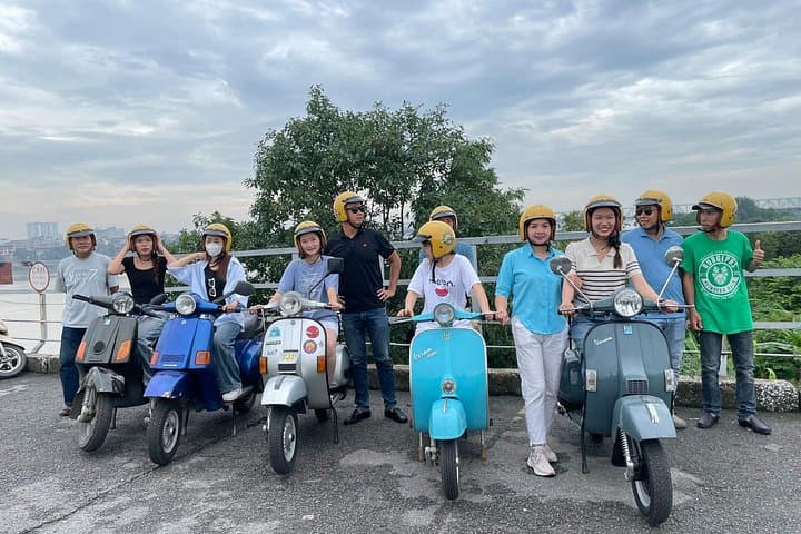 Hanoi Vespa Night Food Tour: Best Street Eats & Train Street Experience photo 1