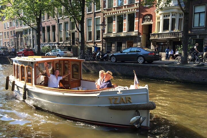 Private Amsterdam Canal Cruise: 2-Hour Historic Boat Tour with Welcome Drink photo 3