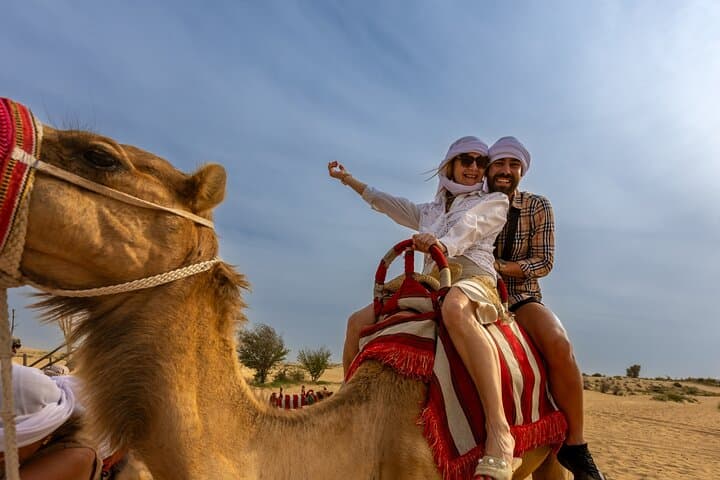 Dubai Desert Quad Biking: Red Dunes, Camel Rides & Sandboarding photo 3