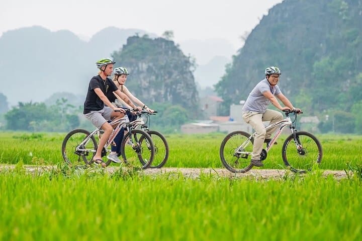 Ninh Binh Day Tour: Hoa Lu Temples, Tam Coc Sampan & Village Cycling photo 5