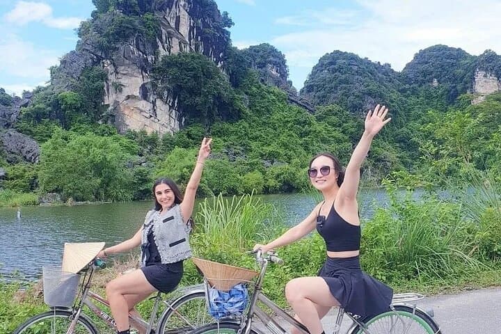 Ninh Binh Day Tour: Hoa Lu Temples, Tam Coc Sampan & Village Cycling photo 6