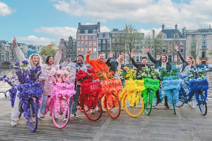 Explore Amsterdam’s Canals on the Iconic Flower Bikes: 1.5‑Hour Guided Tour