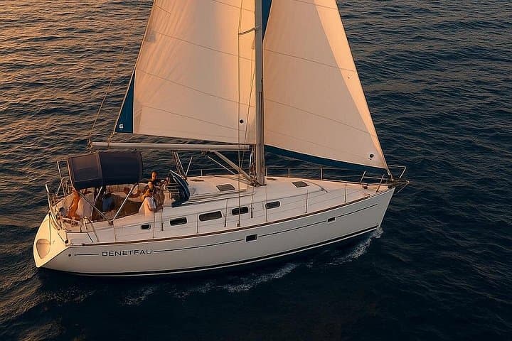 Catania Sunset Sailing: Aperitif, Swim & Intro to Sailing along the Cyclops Riviera