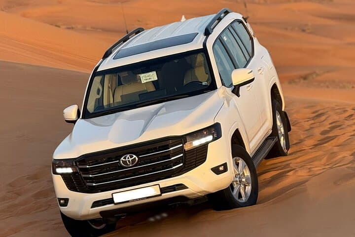 Morning Desert Safari in Dubai: Dune Bashing, Camel Ride & Sandboarding