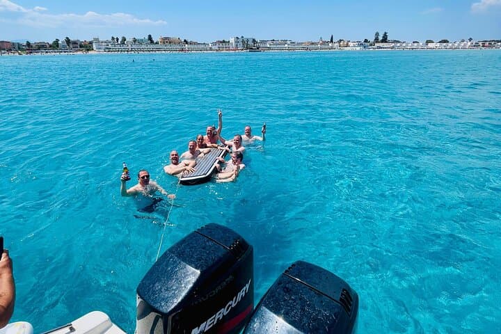 Cagliari Coastal Boat Tour: Sail, Snorkel & Paddle at Poetto and Calamosca photo 3