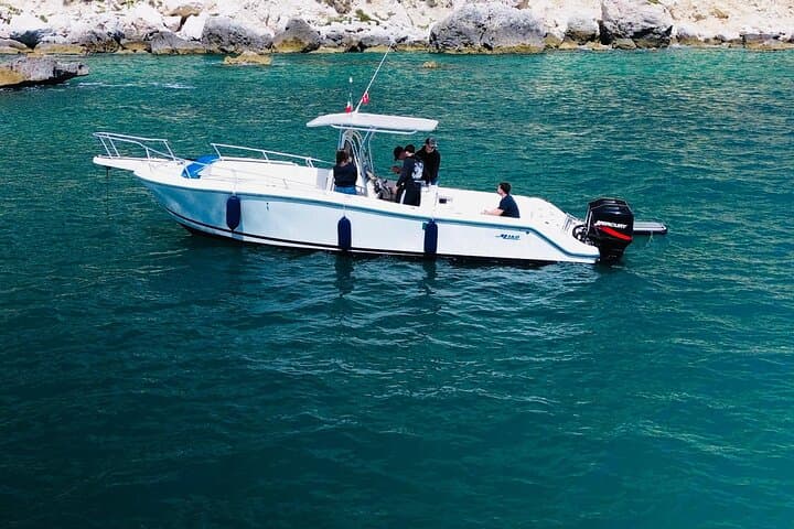 Cagliari Coastal Boat Tour: Sail, Snorkel & Paddle at Poetto and Calamosca photo 5