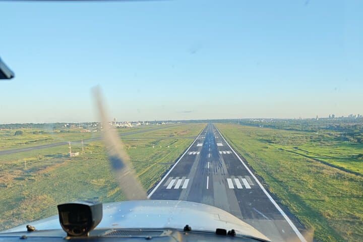Private Panoramic Flight Over Lake Ypacaraí — 30-Minute Asunción Aerial Tour photo 2