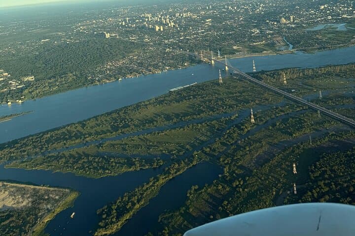 Private Panoramic Flight Over Lake Ypacaraí — 30-Minute Asunción Aerial Tour photo 3