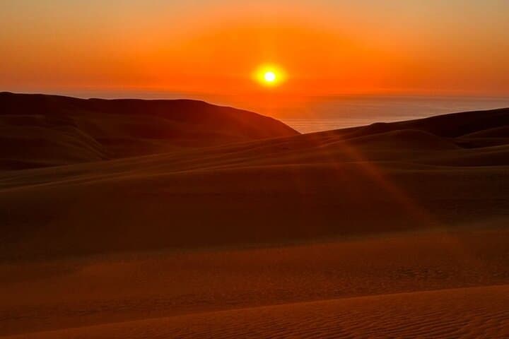 Sandwich Harbour Sunset 4x4 Tour: Dunes, Flamingos & Pink Lake photo 1