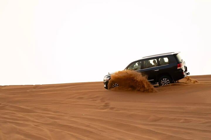 Dubai VIP Desert Safari: Dune Bashing, Camel Ride & BBQ Dinner Experience photo 4