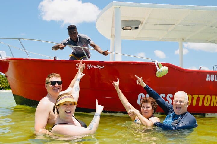 Glass-bottom boat and snorkel tour to Punta Cana's natural pool photo 3