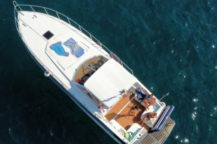Private Boat Tour to Capri: Grottoes, Faraglioni & Seaside Lunch photo 3