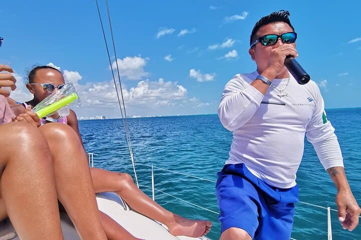 Private Catamaran Party to Isla Mujeres: Snorkel, Open Bar & Sunset Cruise photo 2