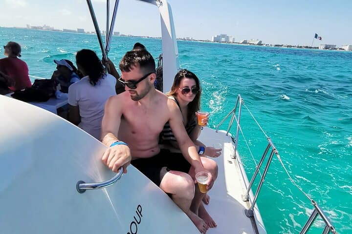 Private Catamaran Party to Isla Mujeres: Snorkel, Open Bar & Sunset Cruise photo 3