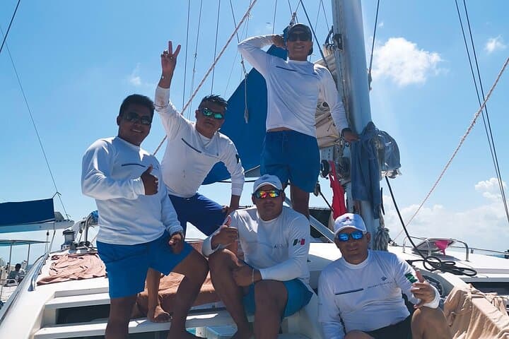 Private Catamaran Party to Isla Mujeres: Snorkel, Open Bar & Sunset Cruise photo 4
