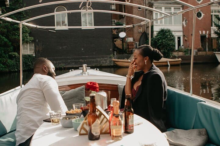 Private Canal Proposal Cruise in Amsterdam — Bubbles, Roses & Iconic Bridges photo 3