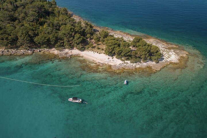 Rovinj Speedboat Island Hopping: Swim, Snorkel & Cliff Jump the Red Islands photo 3