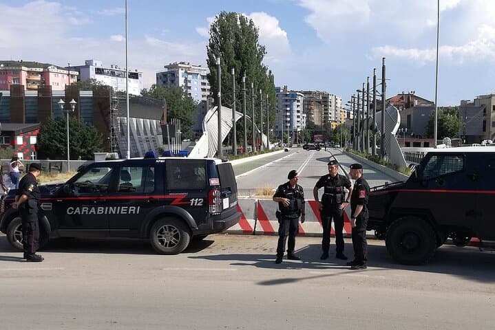 Mitrovica Day Tour from Peja — Stories, Ibar Bridge & a Shot of Raki