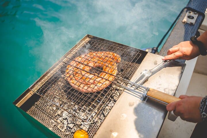 Syracuse Plemmirio Boat Excursion with Barbecue and Snorkeling photo 5