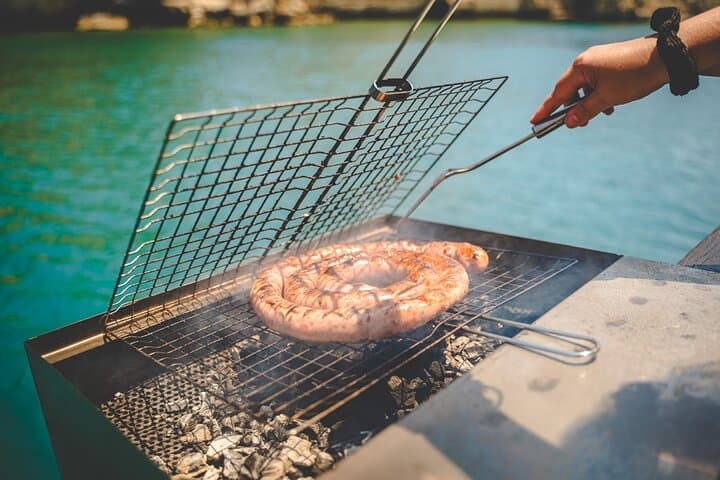 Syracuse Plemmirio Boat Excursion with Barbecue and Snorkeling photo 6