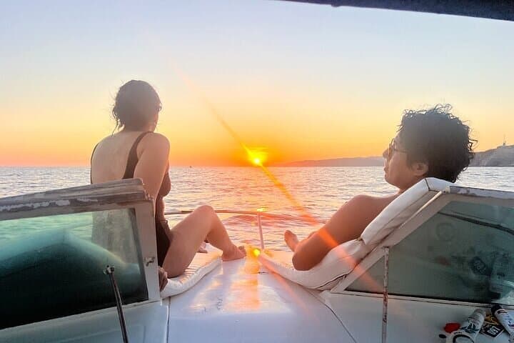 Private Huatulco Sunset Yacht Tour — Dolphins, Mantas & Blue-Flag Beaches photo 5