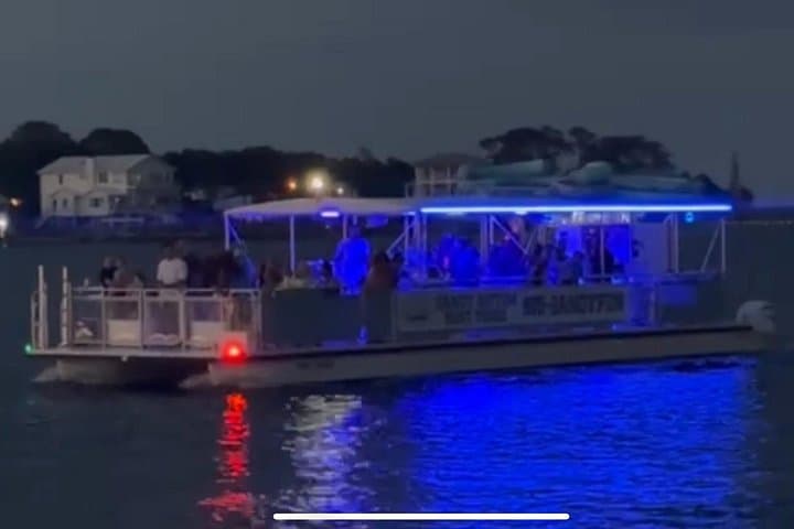Sunset Dolphin Watching Tour in Destin — Evening Cruise to Crab Island photo 1