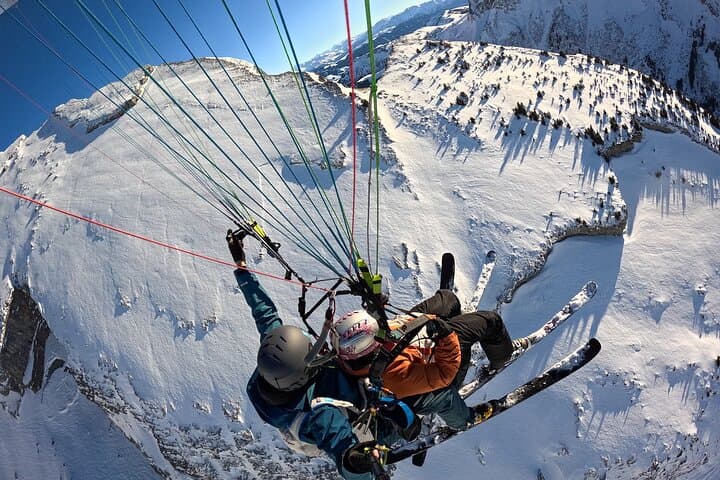 Paragliding Baptism over La Clusaz: 10–15 Minute Tandem Flight from Crêt du Merle