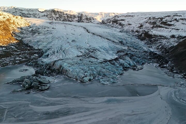 South Coast & Sólheimajökull Glacier Hike — Waterfalls, Black Sand and Ice photo 3