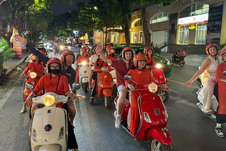 Hanoi Vespa Night Food Tour with Female Riders — 4-Hour Street Food & Train Street Experience photo 1