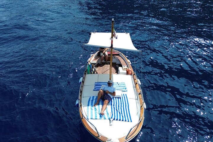 Sunset on a Classic Gozzo in Capri: Prosecco, Faraglioni & Punta Carena Views photo 4
