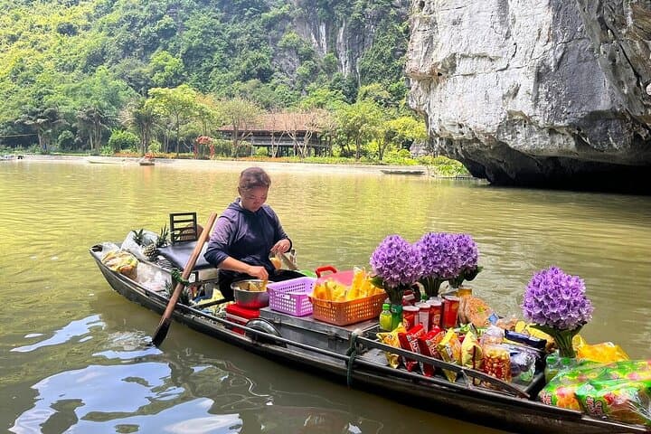 Day Trip to Hoa Lu & Tam Coc: Biking, Bamboo Boat on Ngo Dong and Ancient Temples photo 5