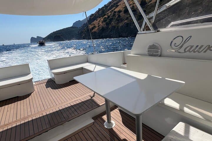 Private Boat Tour to Capri: Grottoes, Faraglioni & Seaside Lunch photo 4