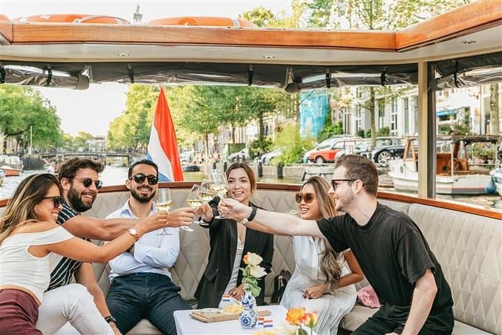 Amsterdam Canal Cruise with Cheese and Wine — 1-Hour Scenic Boat Tour photo 1