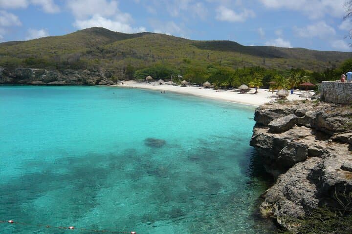 Swim With Turtles and Explore a Hidden Cave: Playa Piskado & Westpunt Beach Tour photo 2