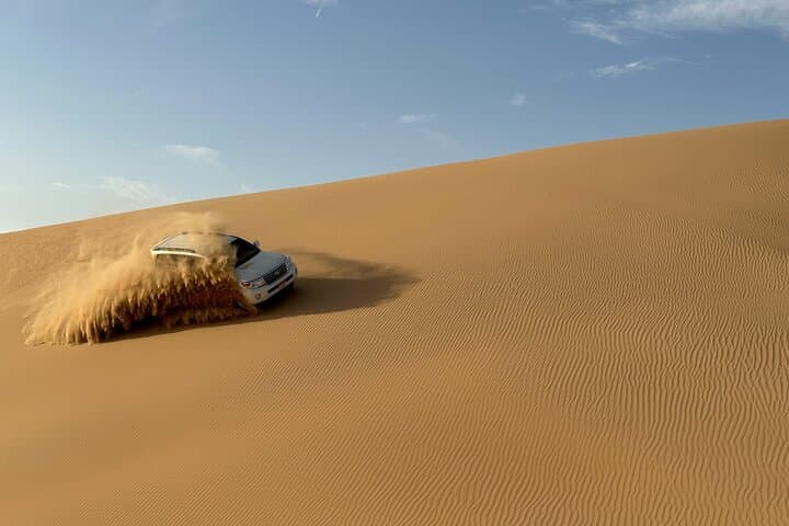 Abu Dhabi Morning Desert Safari: Dune Bashing, Sandboarding & Camel Ride photo 5
