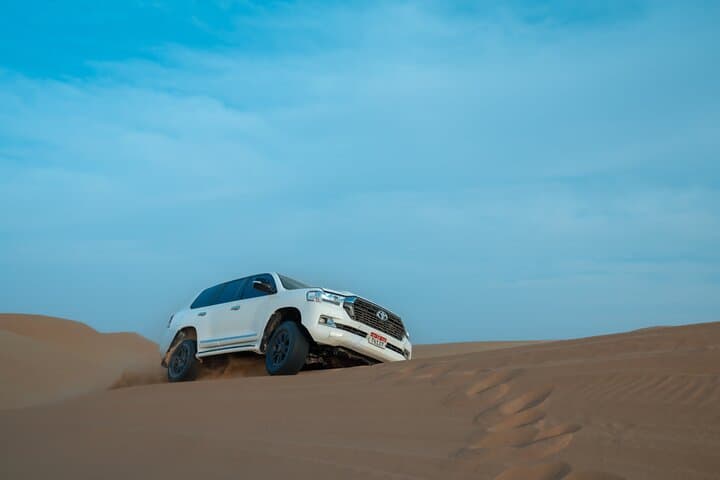 Evening Desert Safari Abu Dhabi: Dune Bashing, Camel Rides & BBQ Under the Stars photo 2