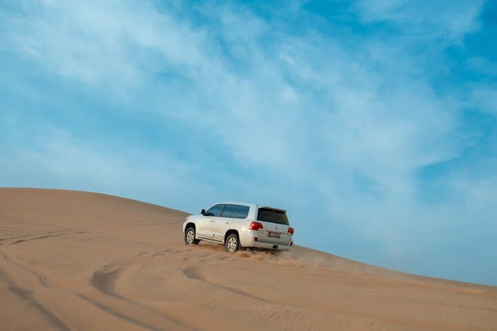 Evening Desert Safari Abu Dhabi: Dune Bashing, Camel Rides & BBQ Under the Stars photo 4