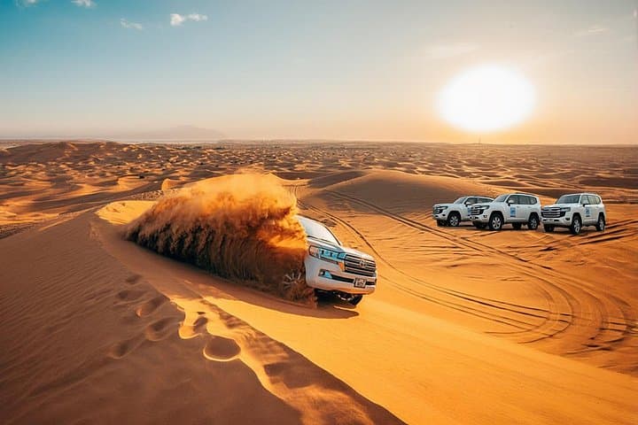 Morning Desert Adventure Dubai — Camel Ride, Dune Bashing & Sandboarding in Lahbab photo 5