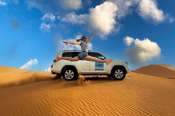 Morning Desert Adventure Dubai — Camel Ride, Dune Bashing & Sandboarding in Lahbab photo 2