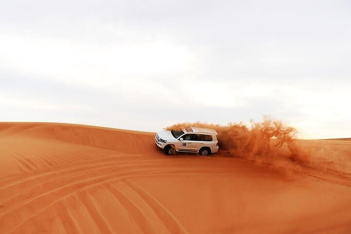 Morning Red-Dune Safari: Dubai Dune Bashing, Sandboarding & Camel Ride photo 3