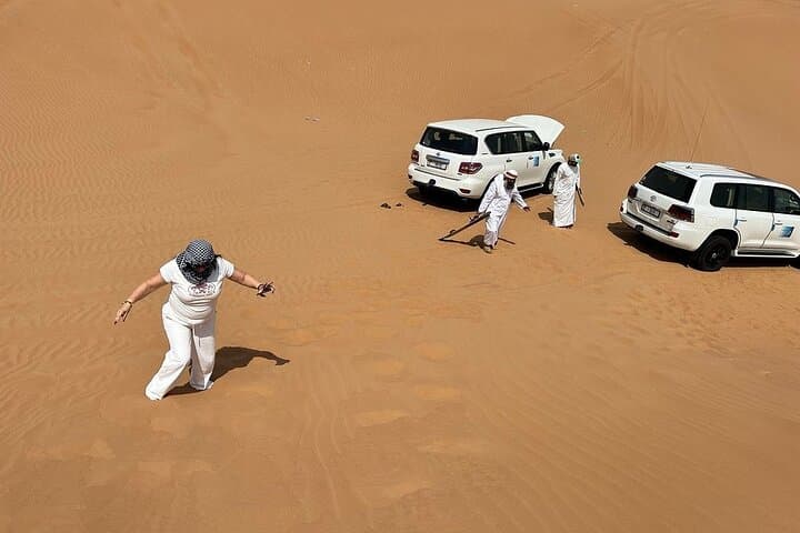 Morning Red-Dune Safari: Dubai Dune Bashing, Sandboarding & Camel Ride