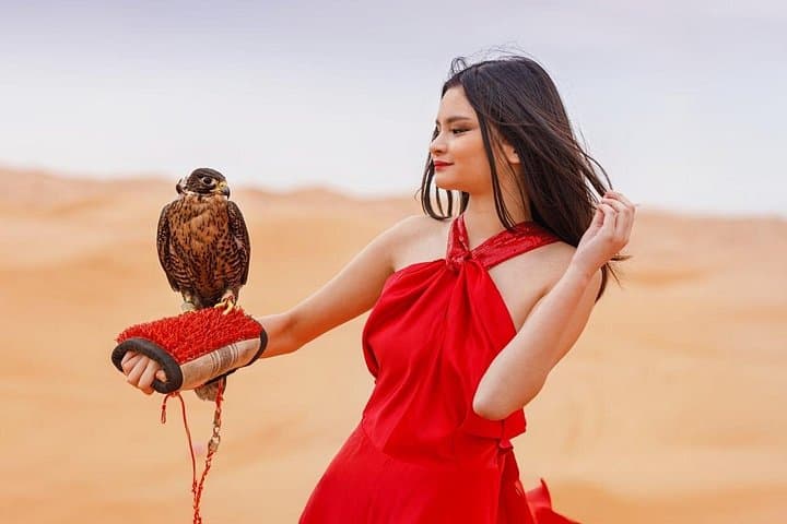 Evening Desert Safari in Lahbab: Camel Rides, Falcon Photos, BBQ & Live Shows photo 2