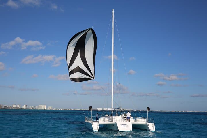 Isla Mujeres Catamaran Adventure: Snorkel, Spinnaker and Beach Club Lunch photo 6
