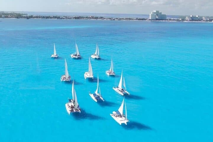 Isla Mujeres Catamaran Adventure: Snorkel, Spinnaker and Beach Club Lunch photo 4